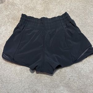 Lululemon high rise hotty hot shorts in color black, size 4, length 2.5